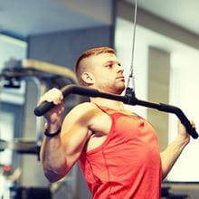 man doing pull downs