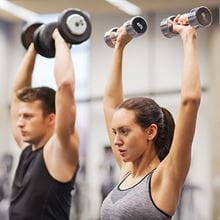 people doing shoulder press