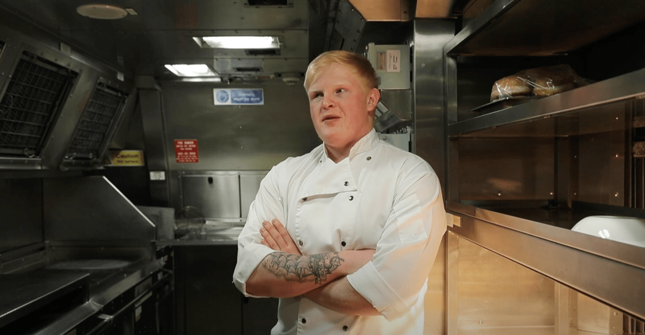A ROyal Navy Submariner caterer in the galley talking about life in the Navy