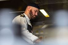 A Navy chef cooking.