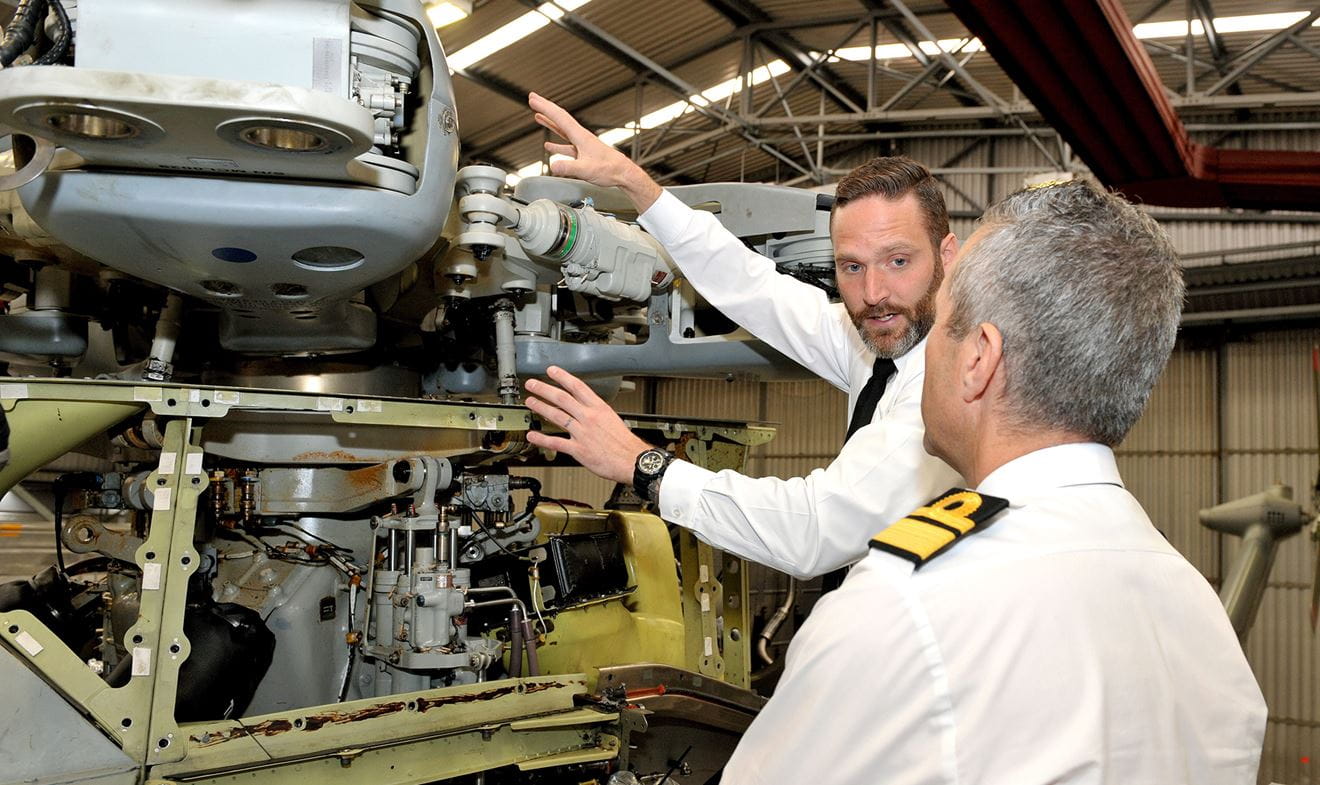 Rear Admiral Blount took time out to talk to CPO Tregenza about his GEMS award and was shown how it works