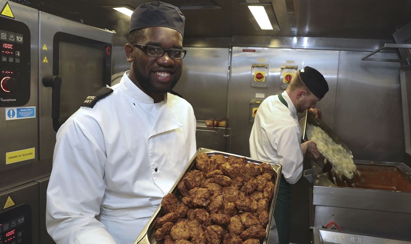 A newly qualified naval chef on his first ship in the galley of the Type 23 frigate HMS Northumberland