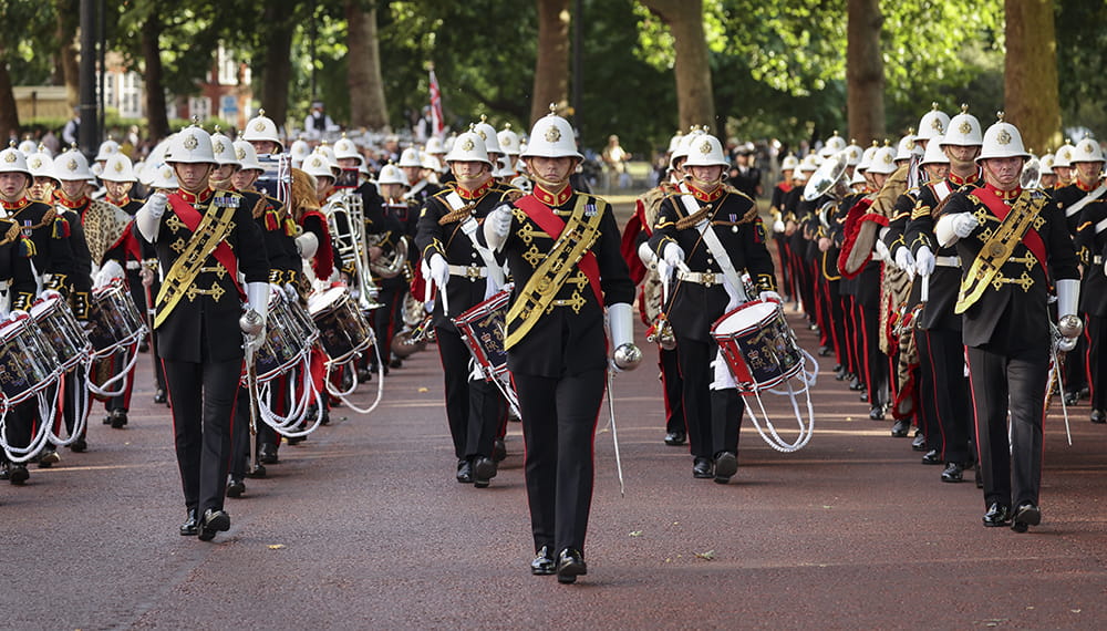Royal Marines massed bands perform beating retreat in London. The massed bands of her Majesty’s Royal Marines march up to Horse Guards parade. 