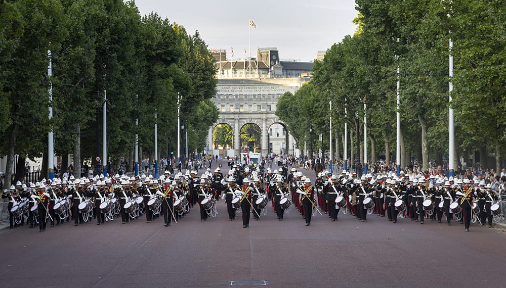Royal Marines massed bands perform beating retreat in London. The massed bands end the evening by marching up the mall.