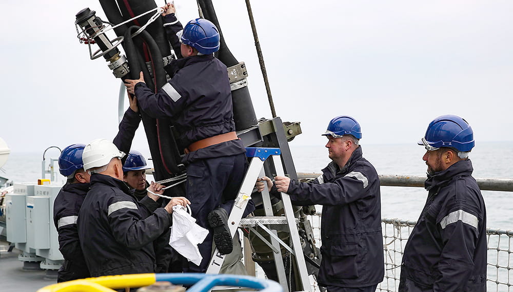 People at work on the RFA Tiderace in Portland. Still imagery as part of video captured onboard for recruitment in the RFA.