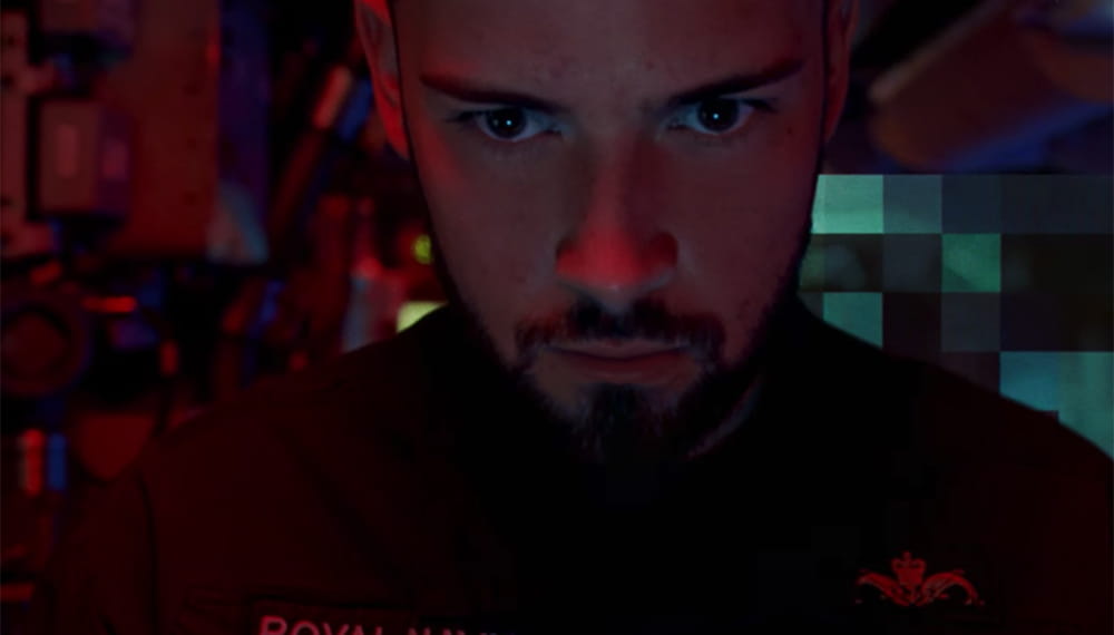 royal-navy-careers-submarine-service-03 The image shows a close up of navy personnel face which is lit by red lighting. Navy technology is advanced. It is used to identify, track and destroy potential threats.