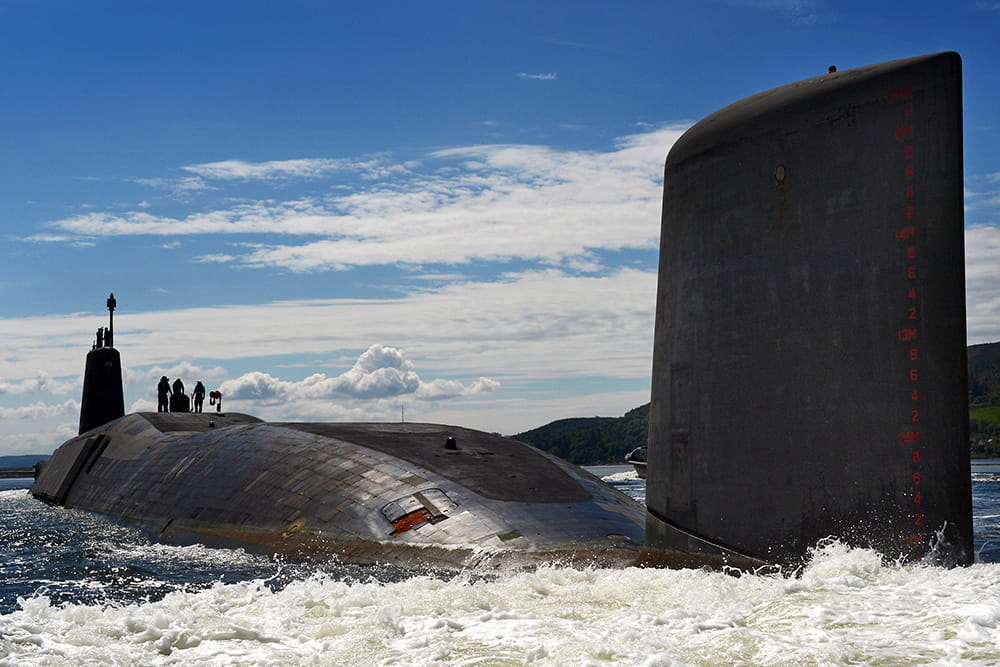 HMS Victorious powers out to sea
