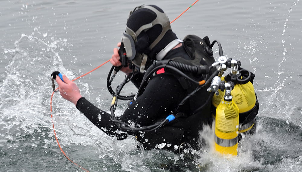Royal-Navy-Bases-and-Stations-Collingwood-05-Diving-School Royal Navy diver entering the water