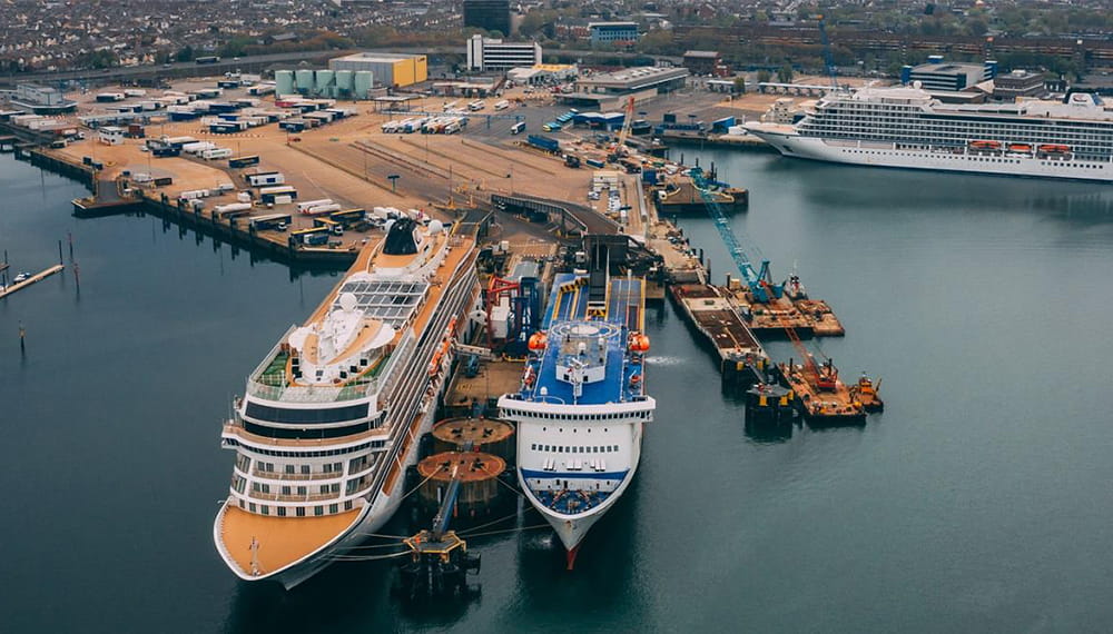 Context image of 2 large ships in Portsmouth international port
