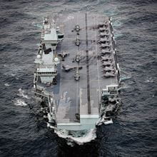Aircraft carrier HMS Queen Elizabeth leads a flotilla of destroyers and frigates 