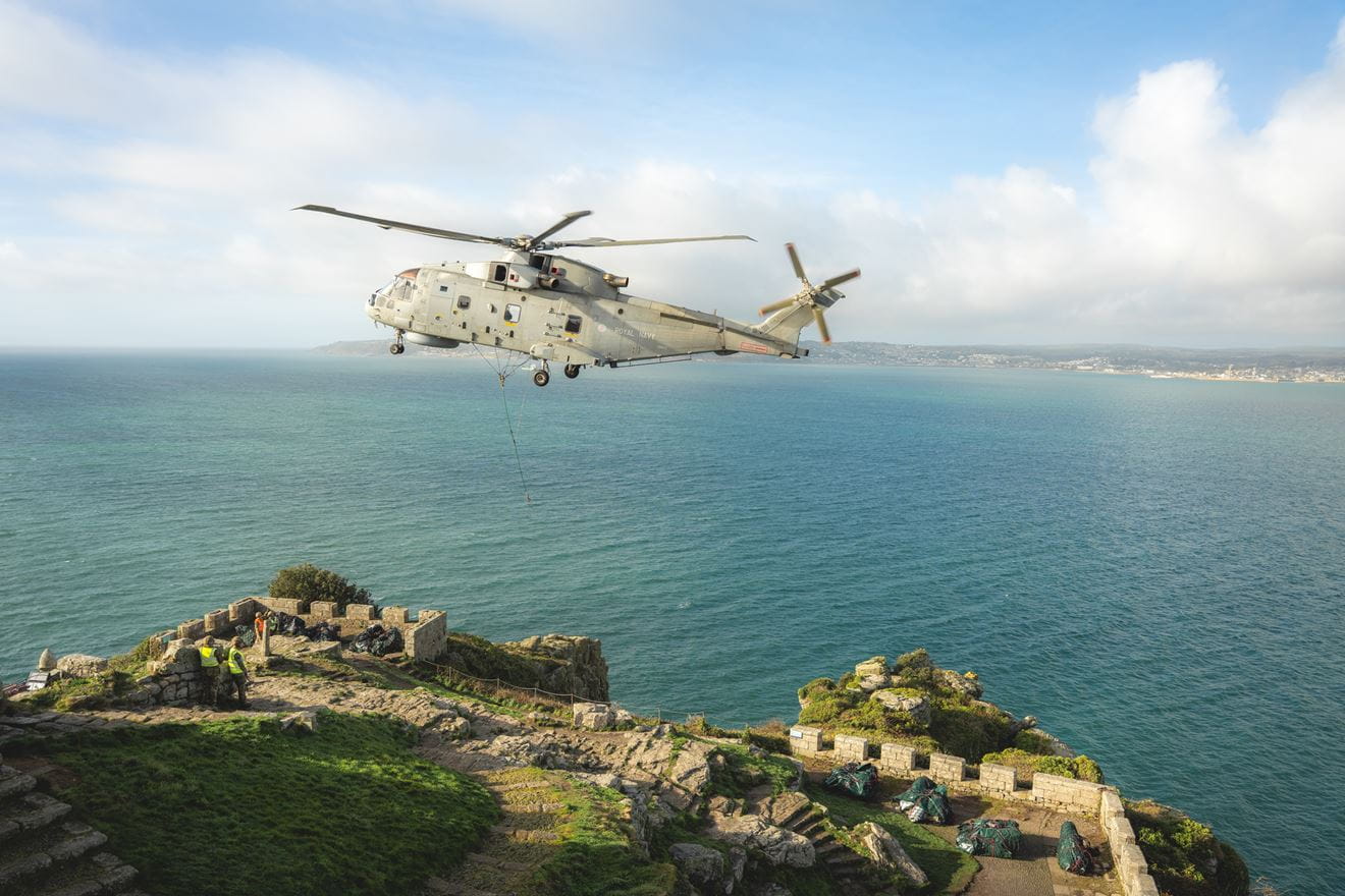 The Merlin returns to the castle on St Michael's Mount to pick up another of the vintage guns The Merlin returns to the castle on St Michael's Mount to pick up another of the vintage guns