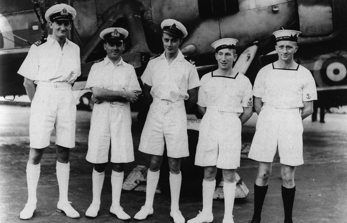 Posthumous VC Winner Eugene Esmonde (second left) pictured in front of a Swordfish on HMS Ark Royal aftet the Bismarck Chase in 1941 Posthumous VC Winner Eugene Esmonde (second left) pictured in front of a Swordfish on HMS Ark Royal aftet the Bismarck Chase in 1941