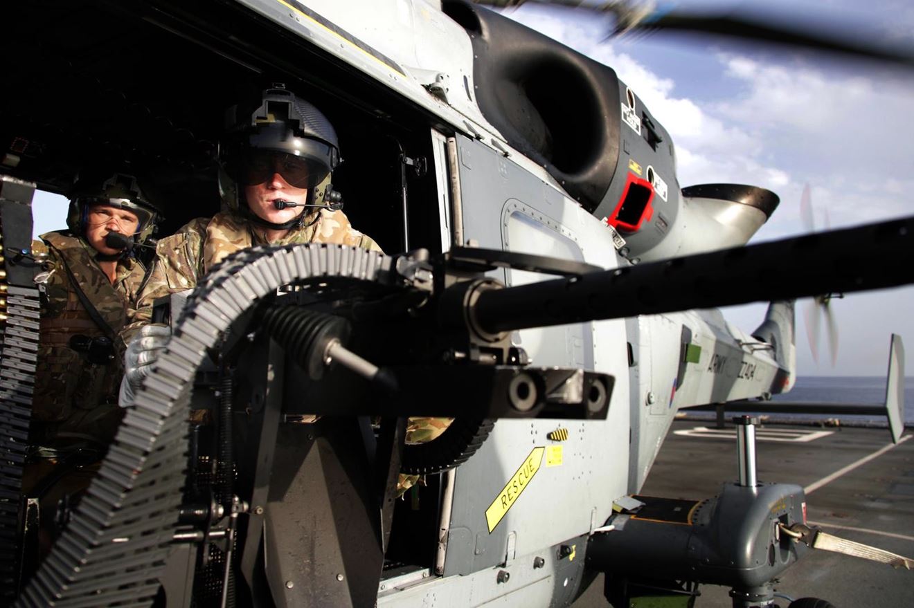 A sniper team from 42 Commando readies its weapon before take off in a Wildcat from RFA Lyme Bay A sniper team from 42 Commando readies its weapon before take off in a Wildcat from RFA Lyme Bay