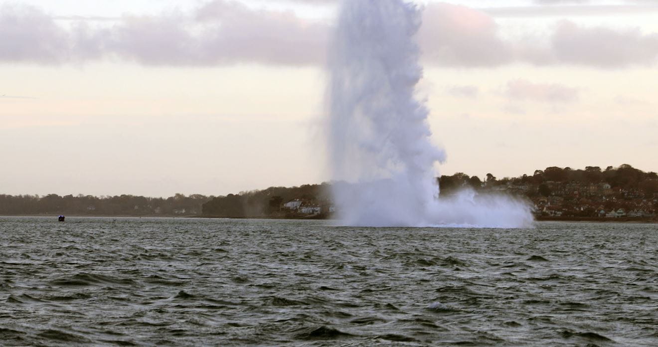 The bomb is detonated by Royal Navy divers