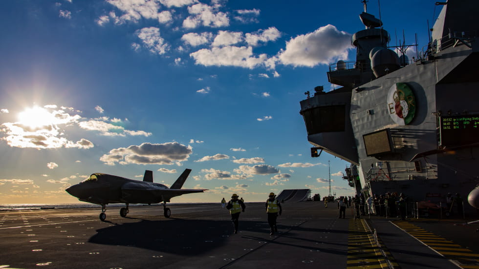 HMS Queen Elizabeth with an F-35 Lightning jet on deck