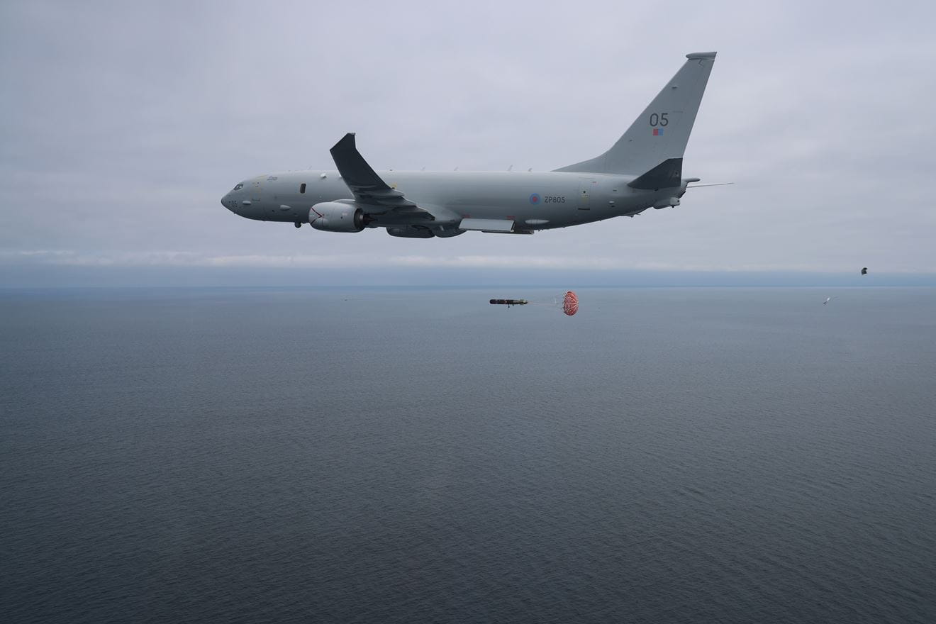 Torpedo away! The Mk56 drops from Fulmar with the drogue parachute deploying to slow its descent Torpedo away! The Mk56 drops from Fulmar with the drogue parachute deploying to slow its descent