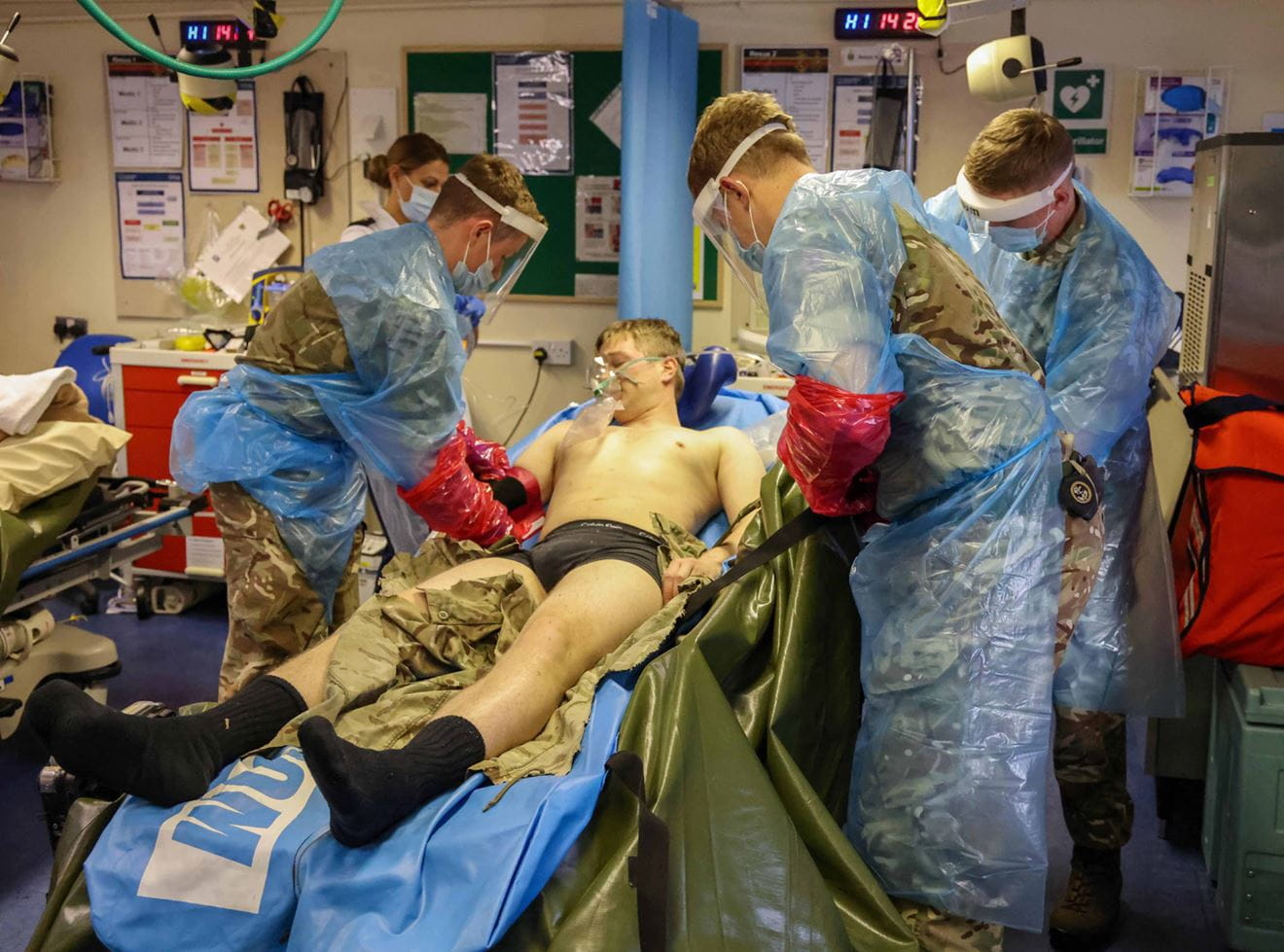 Commando Training Centre Royal Marines medical staff demonstrate the treatment of heat illness in recruits