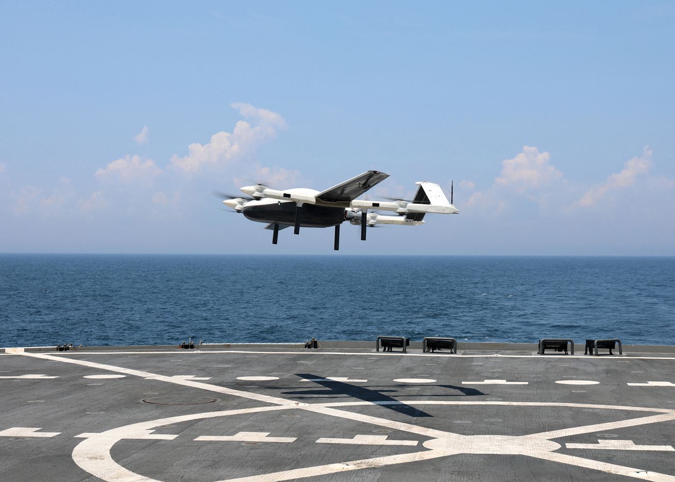 A US Navy drone delivers spare parts to at sea A US Navy drone delivers spare parts to at sea