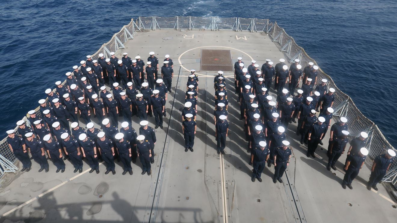 HMS Montrose's crew fill their flight deck HMS Montrose's crew fill their flight deck