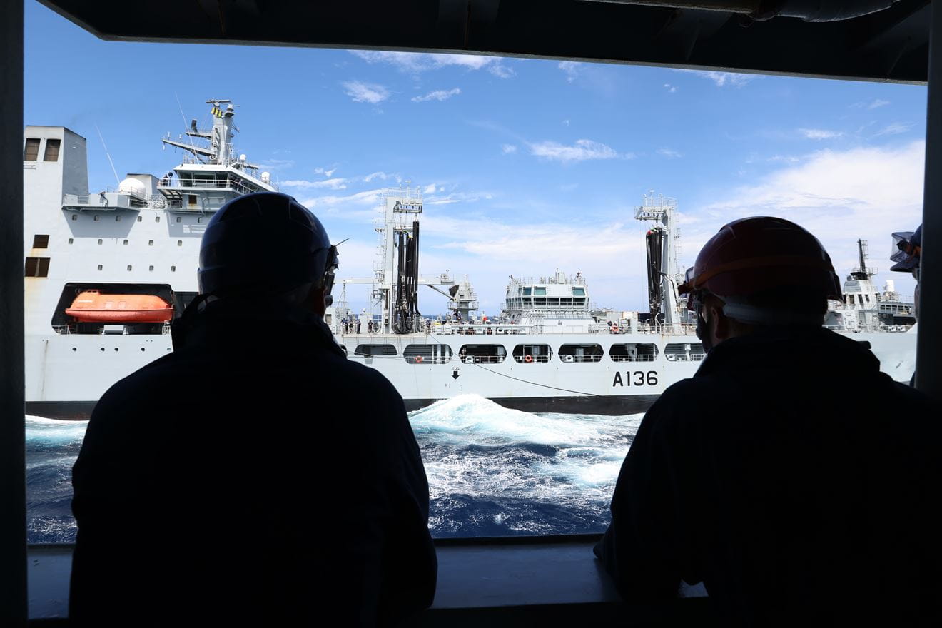 HMS Defender takes on fuel from RFA Tidespring to enable the ship to continue Exercise Pacific Crown. HMS Defender takes on fuel from RFA Tidespring to enable the ship to continue Exercise Pacific Crown.