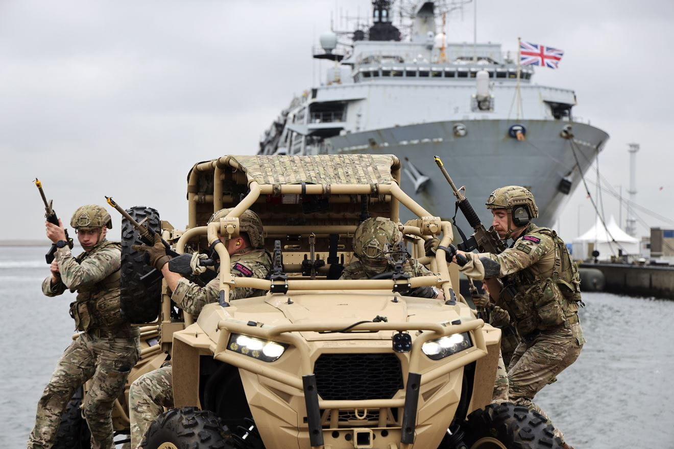 Royal Marines demonstrate the agility and usefulness of their new Polaris MRZR-D4 vehicle Royal Marines demonstrate the agility and usefulness of their new Polaris MRZR-D4 vehicle