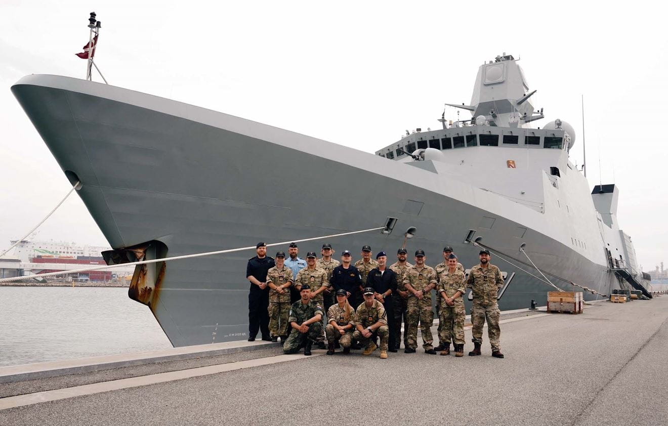 Lt Cdr Rory Hill far left at the back with the NATO flagship staff in front of Iver Huitfeldt