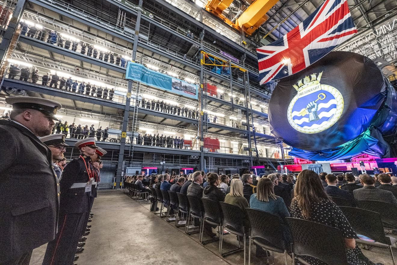 One of the already-completed sections of HMS Dreadnought looms over guests One of the already-completed sections of HMS Dreadnought looms over guests