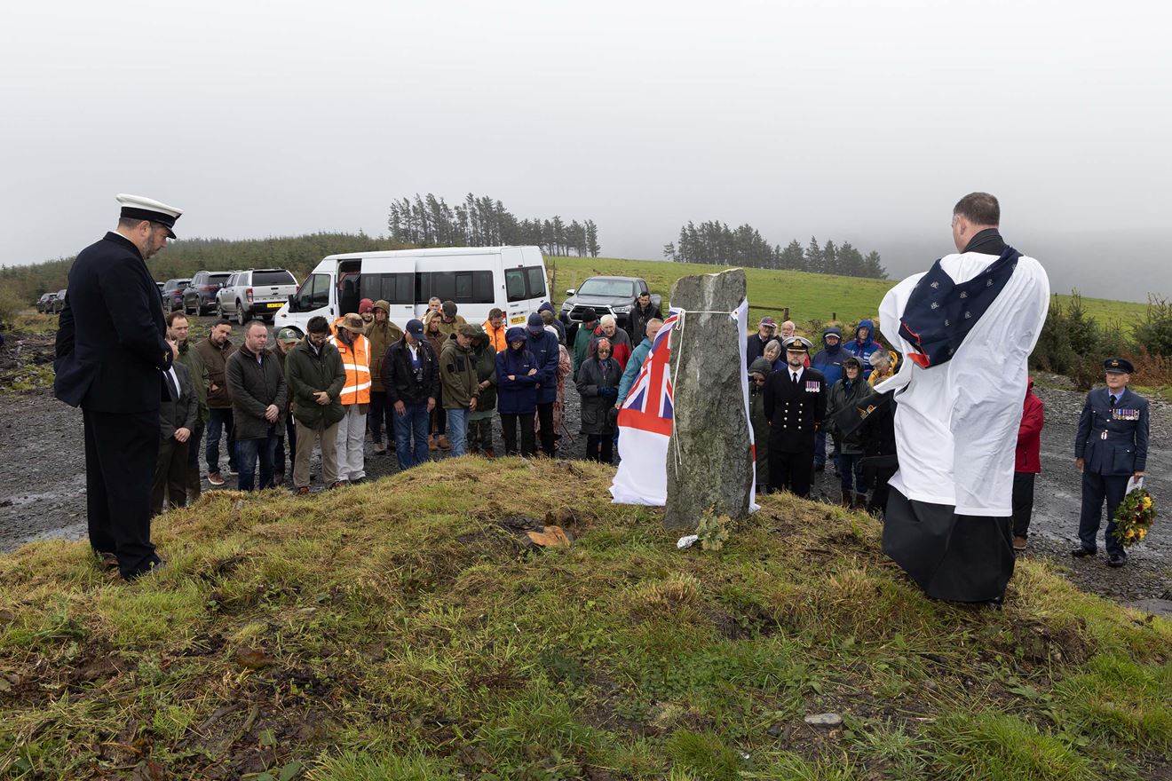 The monument to the three naval fliers is blessed on a bleak day in mid-Wales