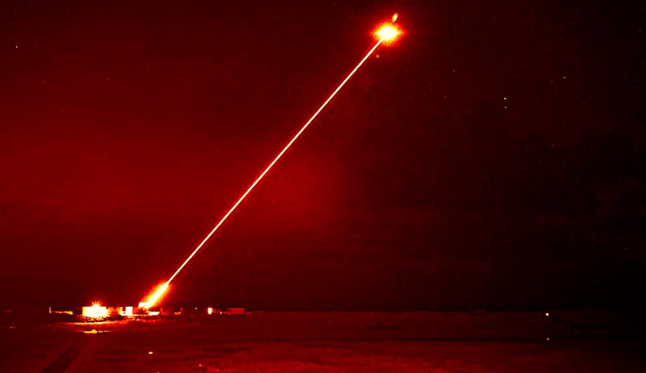 Dragonfire lights up the night as it targets a drone during a midnight interception Dragonfire lights up the night as it targets a drone during a midnight interception