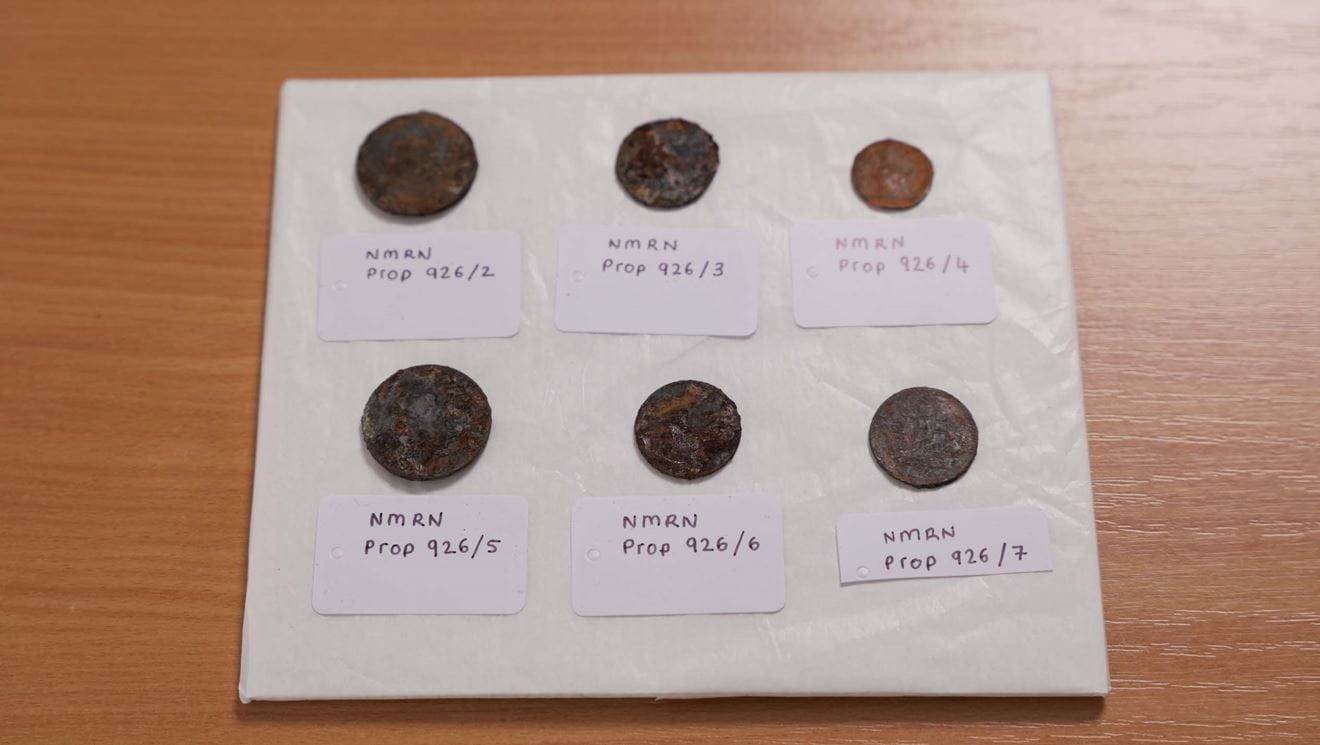Close up of the 19th-century coins discovered beneath the foremast of HMS Victory 