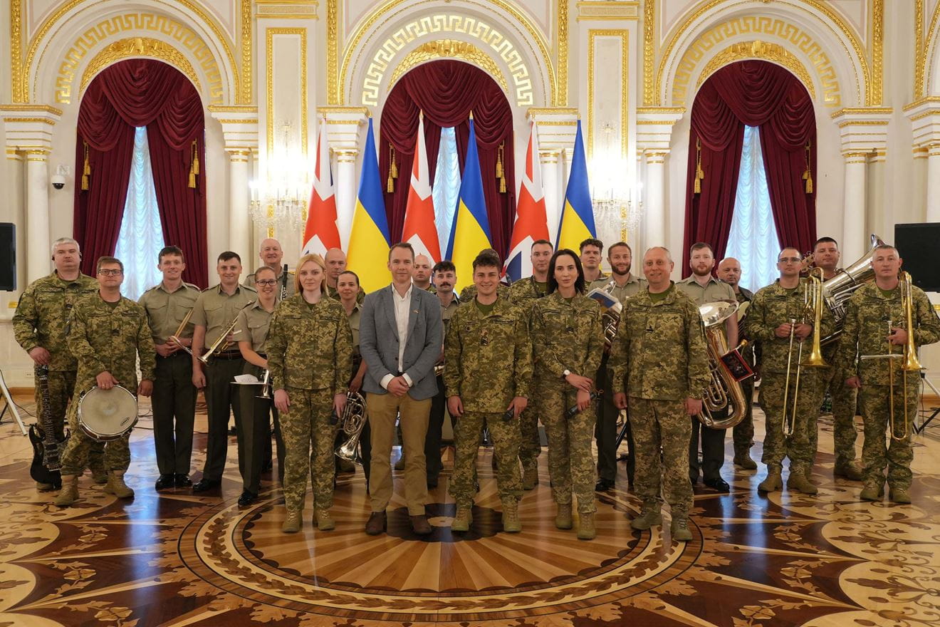 The Royal Marines Musicians and Ukrainian Army Band enjoy an official receptio in Kyiv