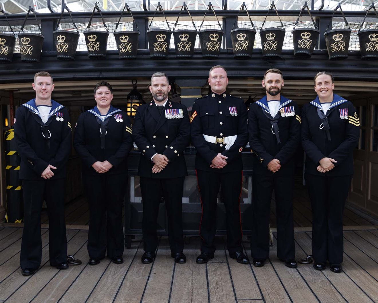 The six successful paramedics aboard HMS Victory