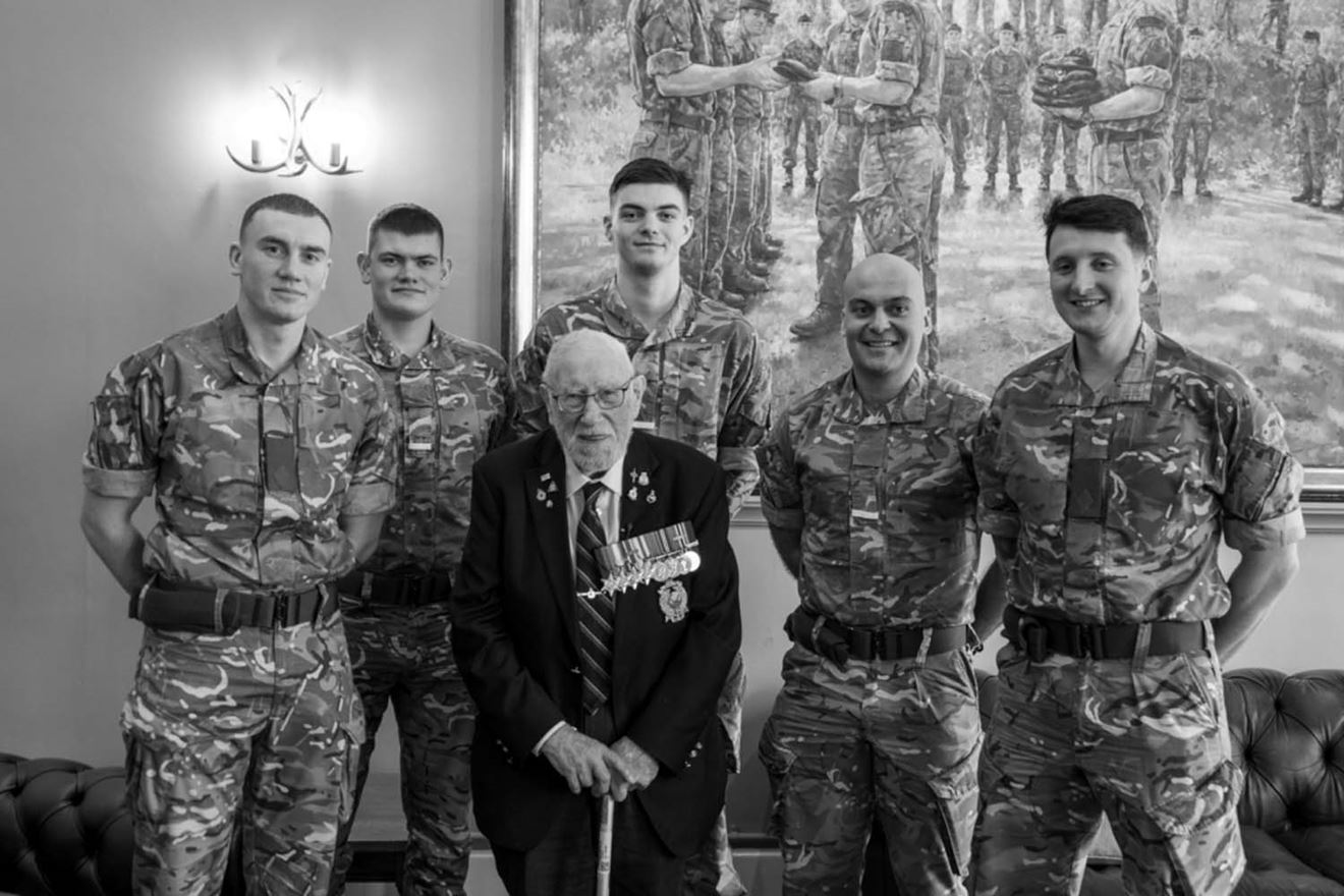 Royal Marines with 100-year-old John Eskdale