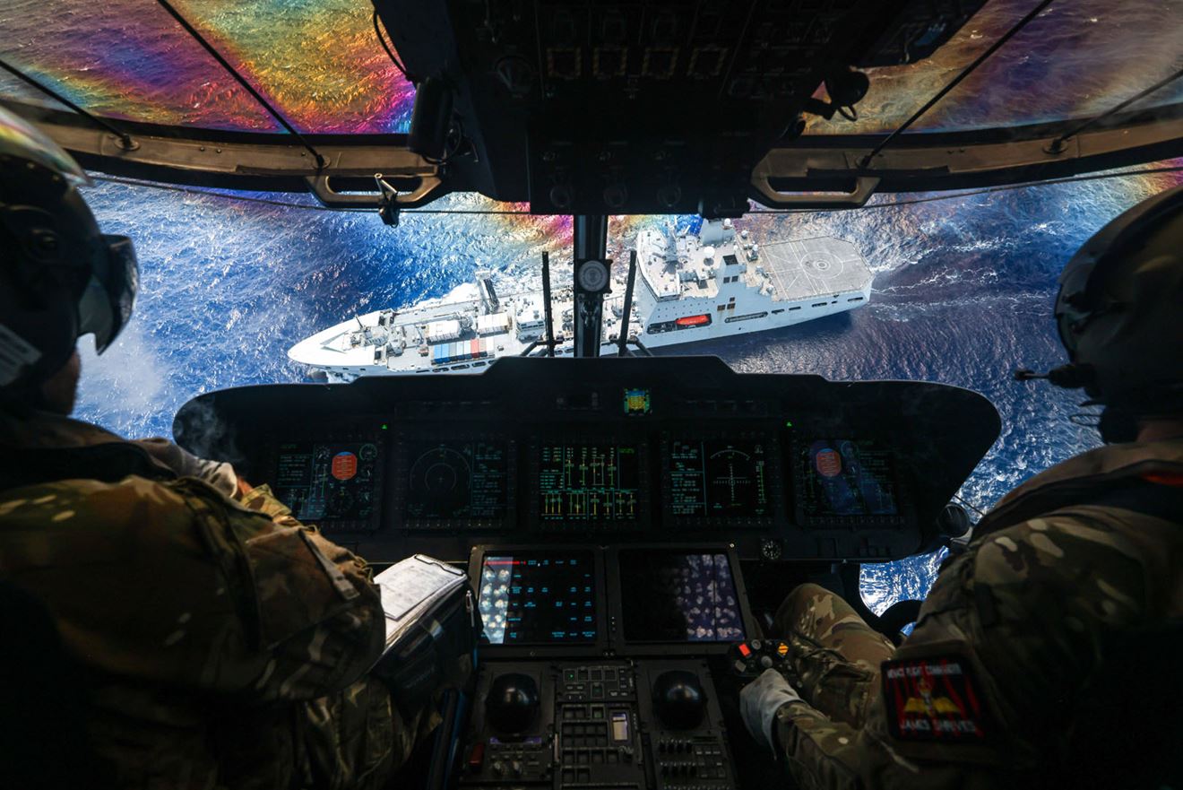 Don't look down... a vertical view of RFA Tidespring from a Merlin of 814 Naval Air Squadron