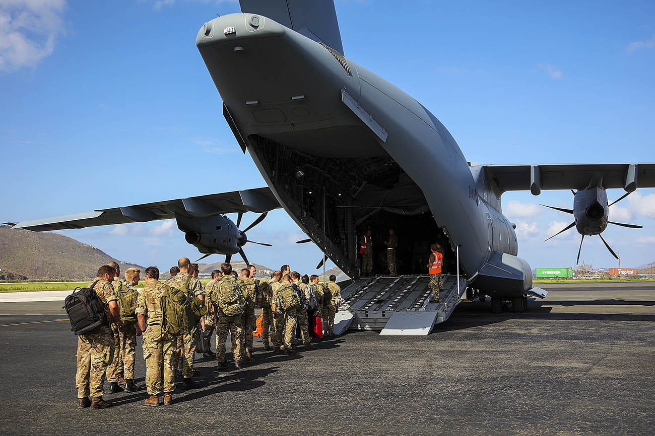 Mission complete: Royal Marines fly home after month-long Caribbean clear-up operation