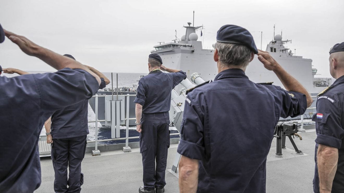 Albion's ship company salute HNLMS Rotterdam as she sails past