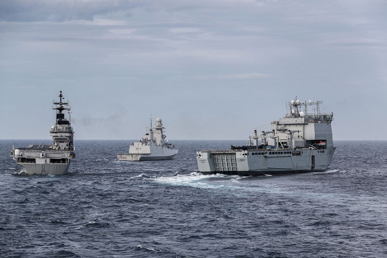 The Italian carrier ITS Giuseppe Garibaldi, frigate ITS Carlo Bergamini and RFA Lyme Bay manoeuvre in close formation The Italian carrier ITS Giuseppe Garibaldi, frigate ITS Carlo Bergamini and RFA Lyme Bay manoeuvre in close formation