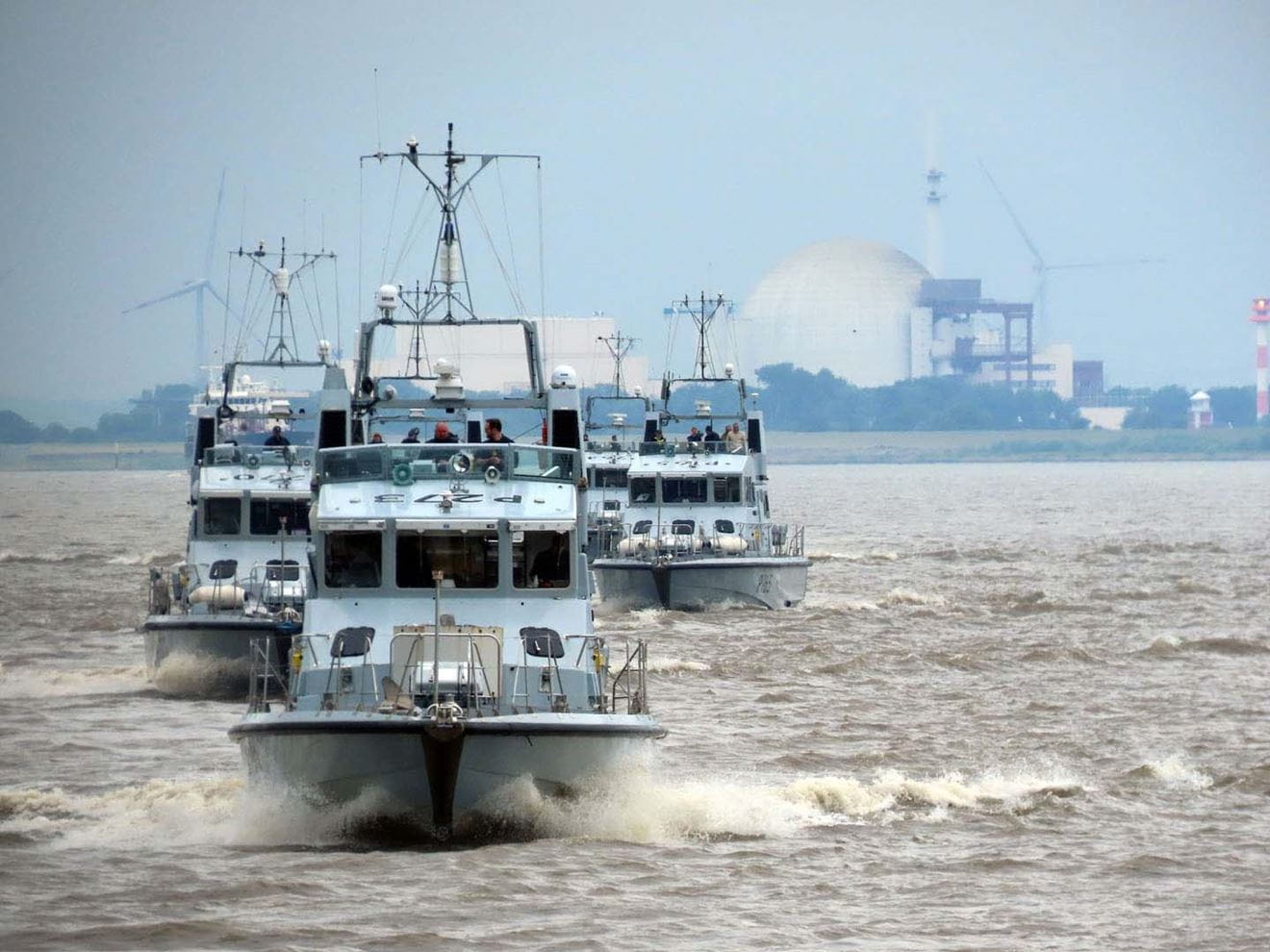 HMS Pursuer leads a formation of P2000s down the River Elbe in Germany earlier this year