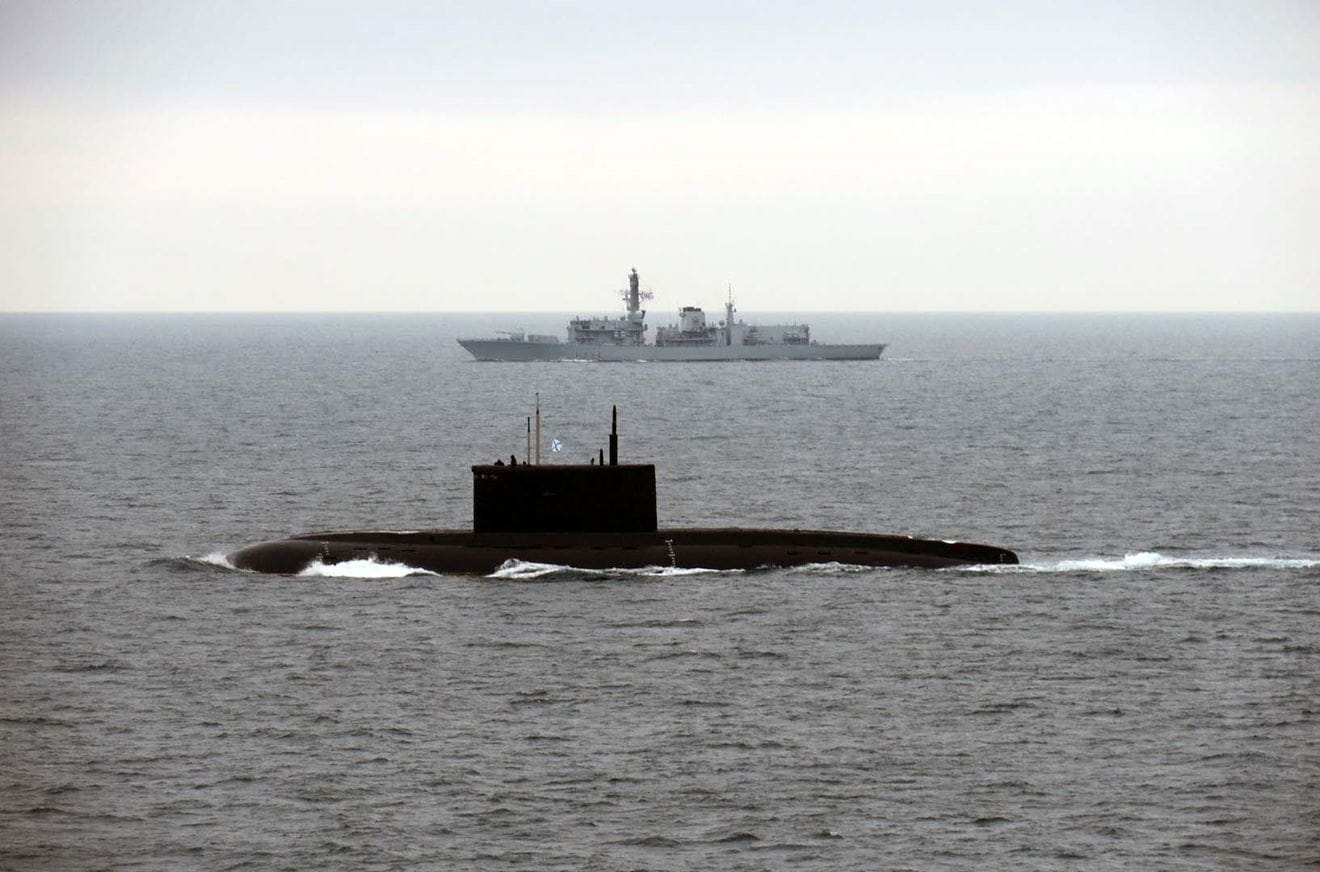 Kilo foreground - HMS Iron Duke in the background