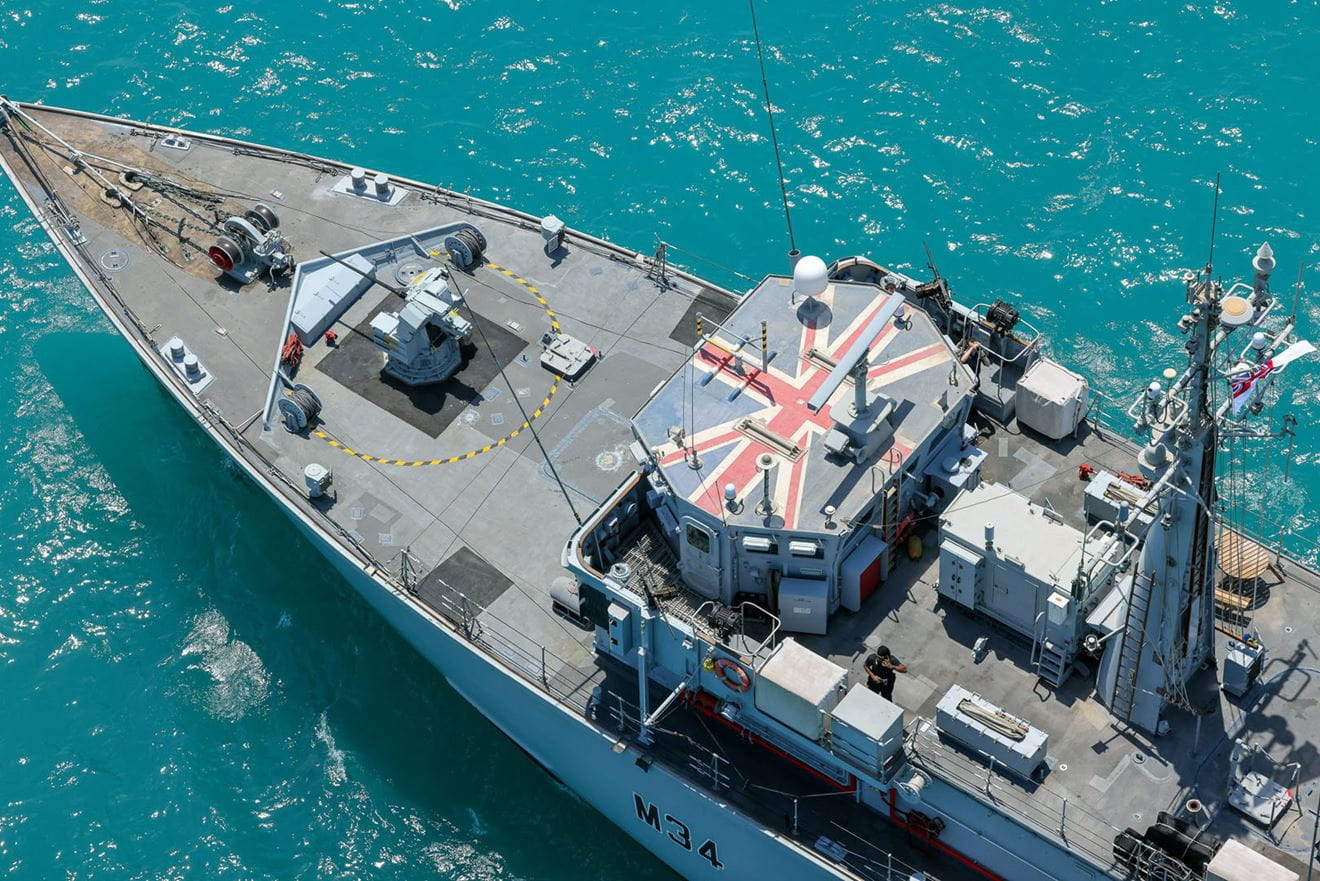 A close-up aerial shot of HMS Middleton's bow and bridge A close-up aerial shot of HMS Middleton's bow and bridge