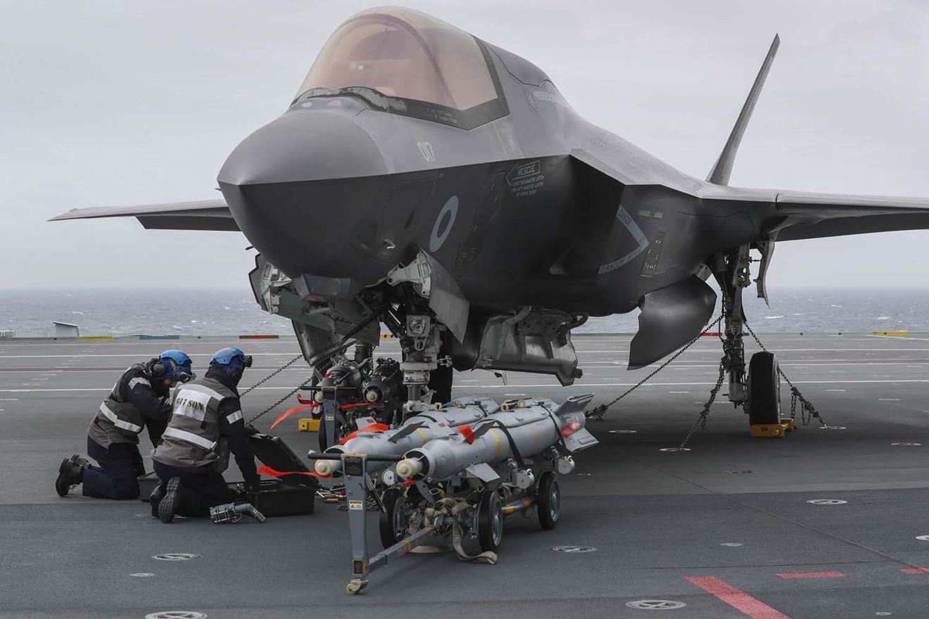 F-35B Lightning jet on HMS Queen Elizabeth being loaded with live ammunition for training drills. Picture: LPhot Belinda Alker