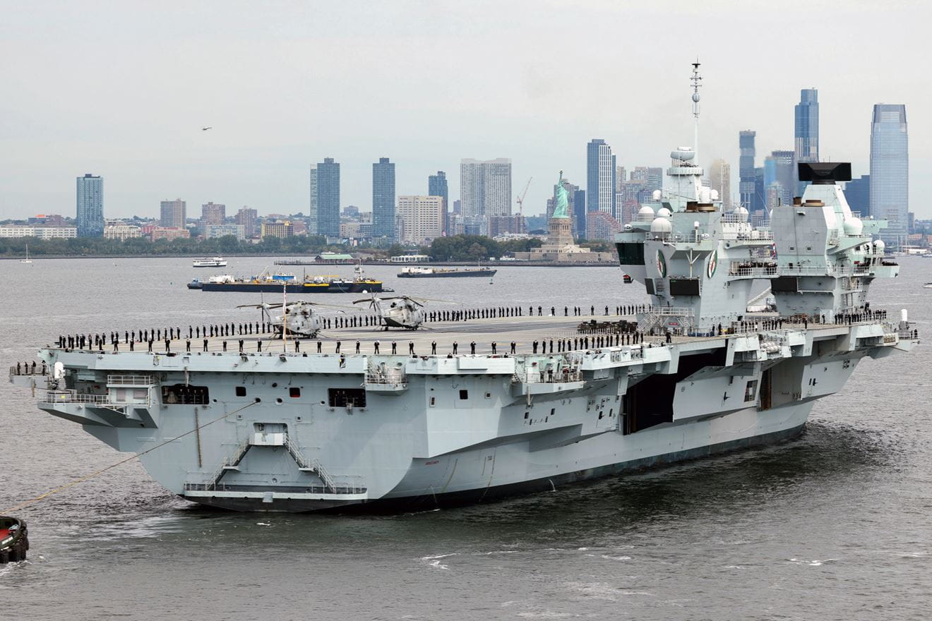 HMS Queen Elizabeth with the iconic New York skyline in the distance HMS Queen Elizabeth with the iconic New York skyline in the distance
