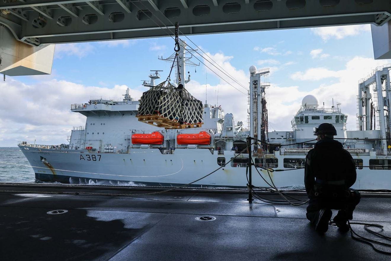 RFA Fort Victoria conducts a replenishment-at-sea (RAS) with HMS Queen Elizabeth. Picture: POPhot Jay Allen