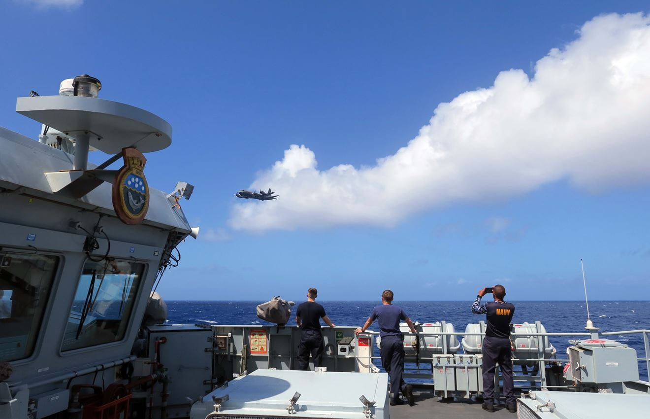 A New Zealand Maritime Patrol Aircraft passes HMS Spey
