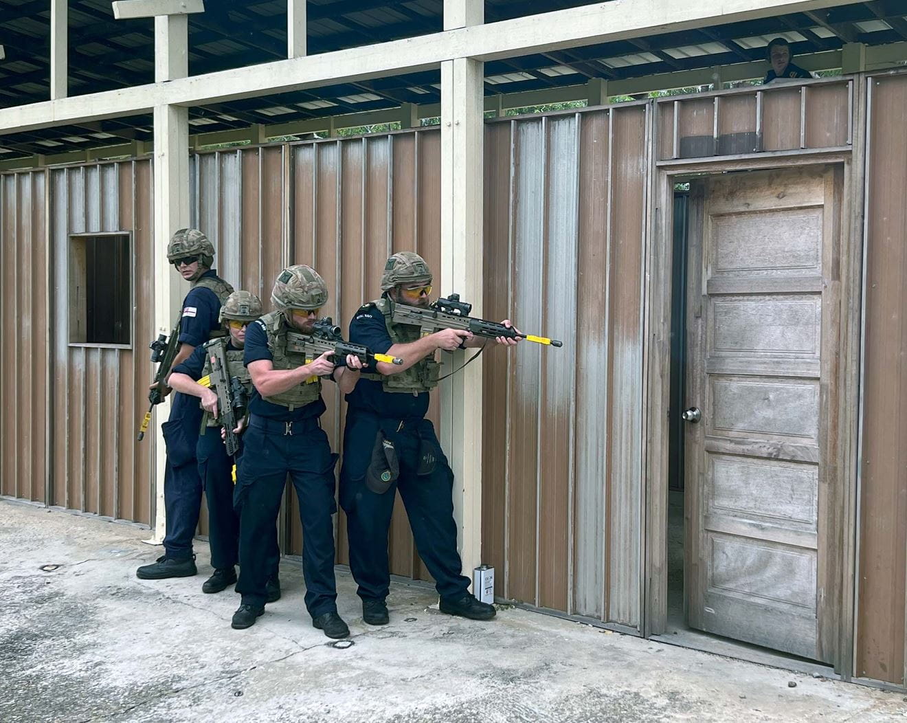 Speys sailors try entry techniques taught by the Gurkhas.