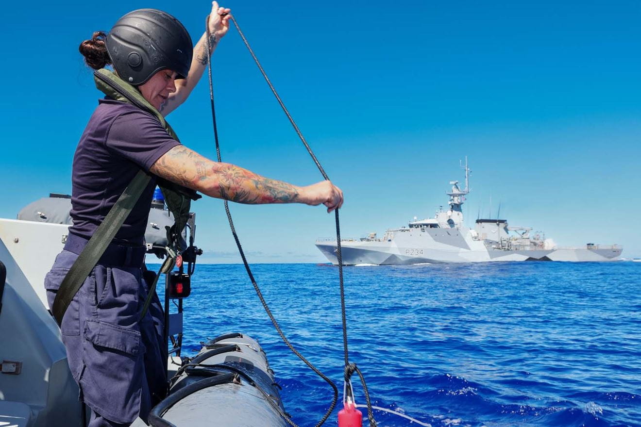 Leading Hand Jenna Dickinson water sampling off Pitcairn. Picture: LPhot Unaisi Luke