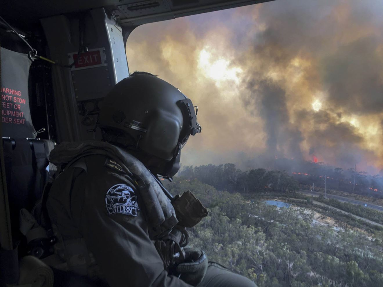 Royal Navy pilot saves lives from Australian bush fires