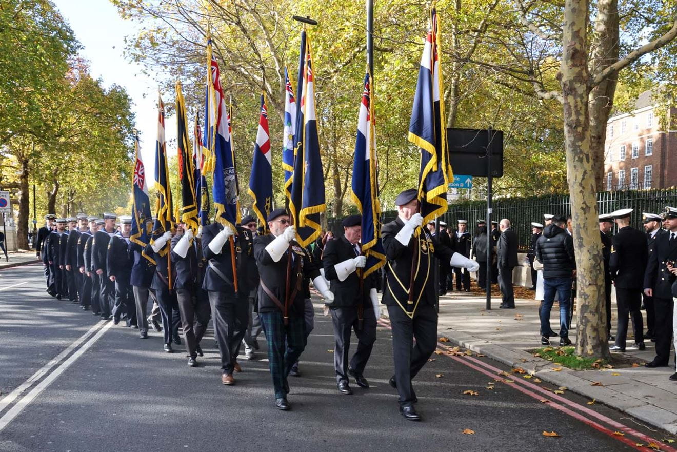 Standard Bearers and serving submariners marching off after the wreath laying at the Submarine Memorial