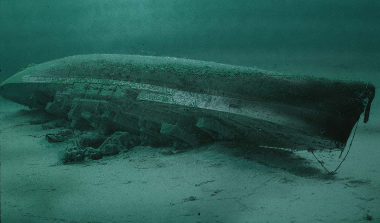 A computer graphic of the wreck of HMS Royal Oak uptrurned on rhe bed of Scapa Flow