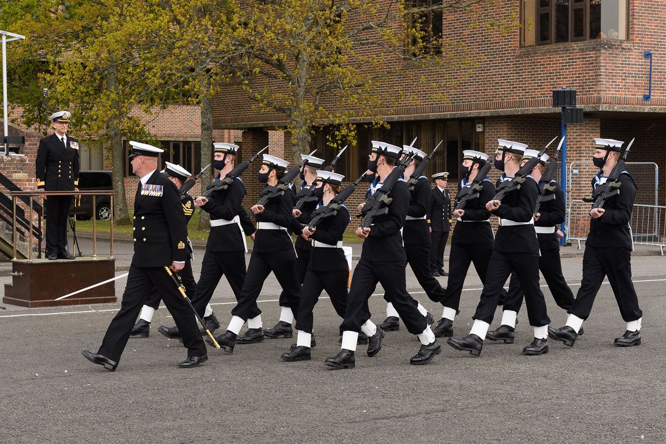 The recruits of Perkins Division march past Commodore Simon Huntington The recruits of Perkins Division march past Commodore Simon Huntington